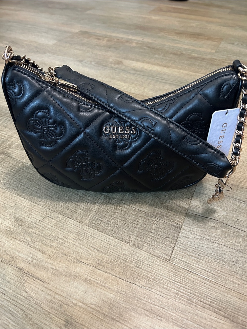 GUESS Black Quilted Crescent Crossbody with Gold Hardware
